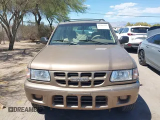 2002 Isuzu Rodeo S z VIN 4S2CK58W024305673, wystawiony jako IAAI lot #42205119 z przebiegiem Nie podano mil oraz . Historia ofert i sprzedaży dostępna na DreamBid. Obrazek 11.