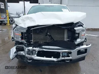 2020 Ford F-150 XL with VIN 1FTEW1E52LFC70461, listed as a IAAI auction lot 42011265 with 51,730 mi miles and . Bid and sale history available at DreamBid. Image 6.
