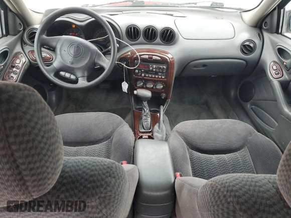 2002 Pontiac Grand Am SE1 z VIN 1G2NF52E42C212352, wystawiony jako Copart lot #83416414 z przebiegiem 132 989 mil mil oraz Czysty tytuł • Clean title. Historia ofert i sprzedaży dostępna na DreamBid. Obrazek 8.