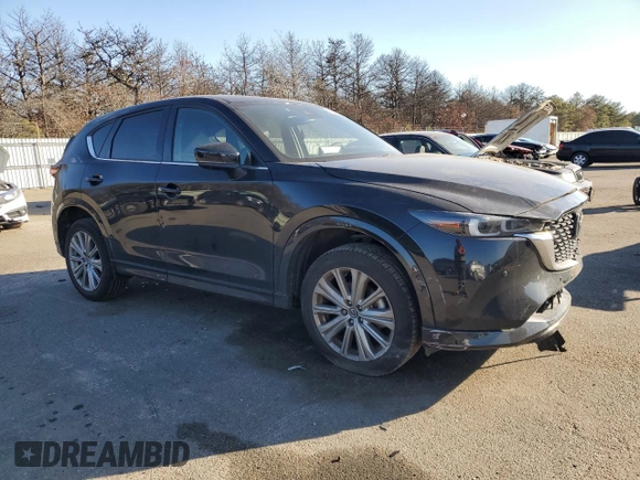 2023 Mazda CX-5 Signature with VIN JM3KFBXYXP0130139, listed as a Copart auction lot 88321445 with 22,911 mi miles and Salvage Title. Bid and sale history available at carsss.com. Image 4.