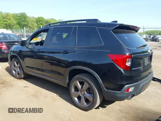 2021 Honda Passport Touring z VIN 5FNYF8H96MB014947, wystawiony jako IAAI lot #42150399 z przebiegiem 47 499 mil mil oraz . Historia ofert i sprzedaży dostępna na DreamBid. Obrazek 3.