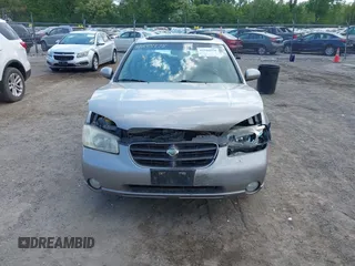 2001 Nissan Maxima GXE с VIN JN1CA31D11T838098, выставлен на аукционе IAAI как лот 42248978 с пробегом 180 614 миль миль и . История ставок и продаж доступна на DreamBid. Изображение 12.