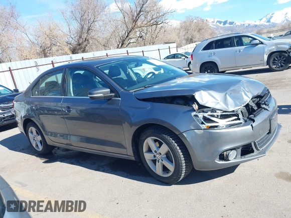 2012 Volkswagen Jetta TDI w/Premium & Nav z VIN 3VWLL7AJ5CM361646, wystawiony jako IAAI lot #41856672 z przebiegiem 190 292 mil mil oraz . Historia ofert i sprzedaży dostępna na DreamBid. Obrazek 13.