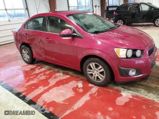 2014 Chevrolet Sonic LT with VIN 1G1JC5SH0E4107134, listed as a Copart auction lot 52568415 with 102,207 mi miles and Salvage Title. Bid and sale history available at carsss.com. Image 4.
