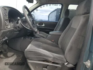 2009 Chevrolet TrailBlazer 1LT with VIN 1GNDS33S092130458, listed as a Copart auction lot 46877675 with 113,885 mi miles and Salvage Title. Bid and sale history available at DreamBid. Image 7.
