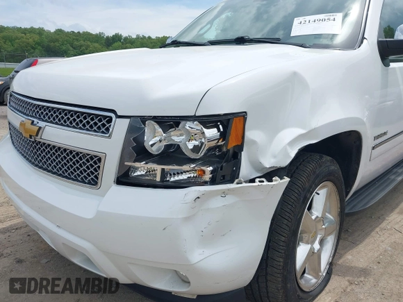 2012 Chevrolet Tahoe LTZ with VIN 1GNSKCE05CR177535, listed as a IAAI auction lot 42149054 with 184,830 mi miles and . Bid and sale history available at DreamBid. Image 6.