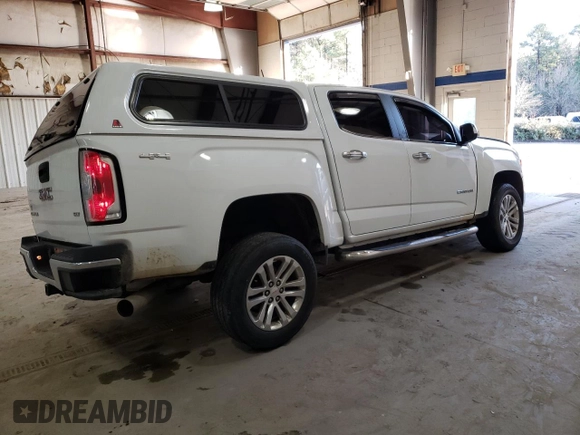 2017 GMC Canyon 4WD SLT with VIN 1GTP6DE12H1250996, listed as a Copart auction lot 44370305 with 93,935 mi miles and Salvage Title. Bid and sale history available at carsss.com. Image 3.