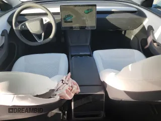 2025 Tesla Model 3 Long Range with VIN 5YJ3E1EAXSF935004, listed as a Copart auction lot 52233195 with 5,873 mi miles and Salvage Title. Bid and sale history available at carsss.com. Image 8.