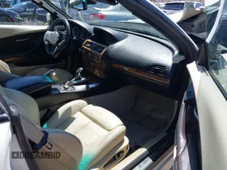 2009 BMW 6 Series 650i z VIN WBAEB53579CX64649, wystawiony jako IAAI lot #41937705 z przebiegiem 136 164 mil mil oraz . Historia ofert i sprzedaży dostępna na DreamBid. Obrazek 5.