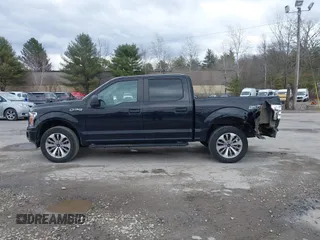 2018 Ford F-150 XL with VIN 1FTEW1EP2JFC58602, listed as a IAAI auction lot 41861045 with 149,399 mi miles. Bid and sale history available at carsss.com. Image 14.