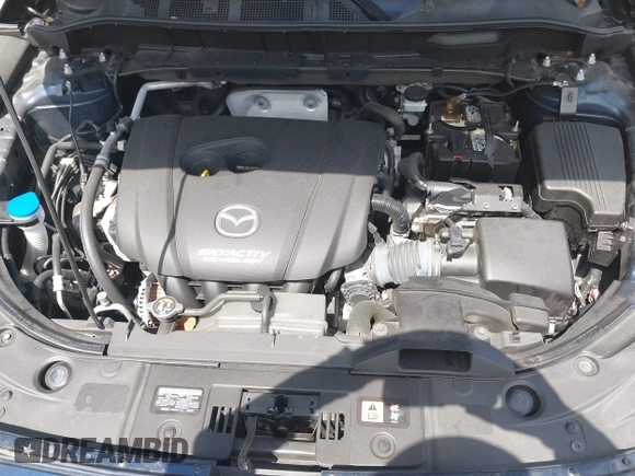 2017 Mazda CX-5 Touring with VIN JM3KFACL0H0227615, listed as a IAAI auction lot 42063618 with 72,291 mi miles. Bid and sale history available at carsss.com. Image 10.