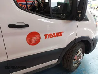 2021 Ford Transit Cargo with VIN 1FTBR2YG2MKA51800, listed as a IAAI auction lot 42793917 with 61,733 mi miles and . Bid and sale history available at DreamBid. Image 10.