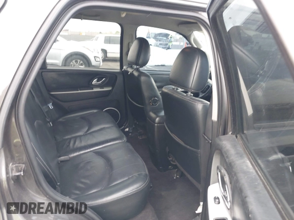 2006 Mercury Mariner Luxury with VIN 4M2YU56186KJ01007, listed as a IAAI auction lot 42619715 with 157,209 mi miles and . Bid and sale history available at DreamBid. Image 8.