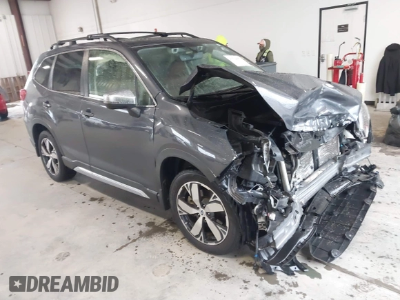 2021 Subaru Forester Touring with VIN JF2SKAXC8MH500831, listed as a IAAI auction lot 41564481 with 56,403 mi miles and . Bid and sale history available at DreamBid. Image 1.