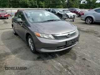 2012 Honda Civic LX z VIN 19XFB2F55CE109410, wystawiony jako Copart lot #74462994 z przebiegiem Nie podano mil oraz Szkoda całkowita • Salvage title. Historia ofert i sprzedaży dostępna na DreamBid. Obrazek 13.