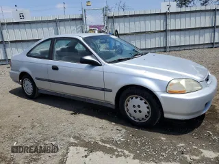 1997 Honda Civic DX with VIN 1HGEJ6128VL021000, listed as a Copart auction lot 56716604 with 152,654 mi miles and Salvage Title. Bid and sale history available at carsss.com. Image 4.