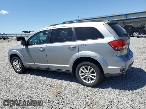 2017 Dodge Journey SXT with VIN 3C4PDDBG3HT591993, listed as a Copart auction lot 58241065 with 161,964 mi miles and Salvage title. Bid and sale history available at DreamBid. Image 2.