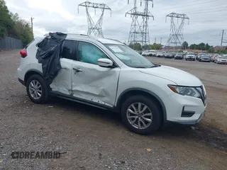 2017 Nissan Rogue SV with VIN KNMAT2MV9HP604372, listed as a IAAI auction lot 40372180 with 96,924 mi miles. Bid and sale history available at carsss.com. Image 1.