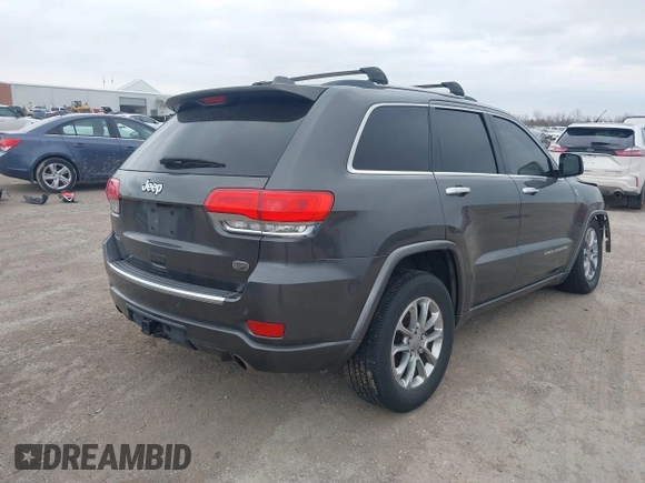 2015 Jeep Grand Cherokee Overland with VIN 1C4RJFCT3FC131122, listed as a IAAI auction lot 41513892 with 125,765 mi miles. Bid and sale history available at carsss.com. Image 4.