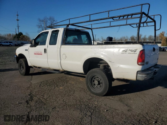 2002 Ford F-350 XL with VIN 1FTSX31S72ED14126, listed as a Copart auction lot 82688484 with 202,780 mi miles and Salvage Title. Bid and sale history available at DreamBid. Image 2.