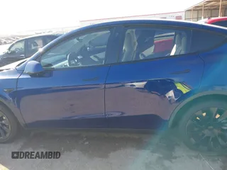 2021 Tesla Model Y Standard Range with VIN 5YJYGDED5MF121874, listed as a IAAI auction lot 41238170 with 72,041 mi miles and . Bid and sale history available at DreamBid. Image 14.
