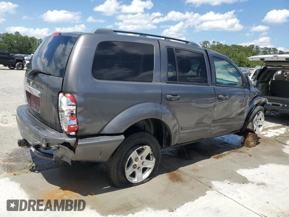 2004 Dodge Durango SLT with VIN 1D4HD48NX4F167468, listed as a Copart auction lot 56665595 with 275,747 mi miles and Salvage title. Bid and sale history available at DreamBid. Image 3.