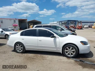 2005 Nissan Altima 2.5 S with VIN 1N4AL11EX5C323608, listed as a IAAI auction lot 41962367 with 160,026 mi miles. Bid and sale history available at carsss.com. Image 13.
