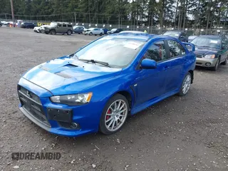 2015 Mitsubishi Lancer Evolution GSR with VIN JA32W8FV4FU012578, listed as a IAAI auction lot 41730742 with 64,762 mi miles. Bid and sale history available at carsss.com. Image 18.