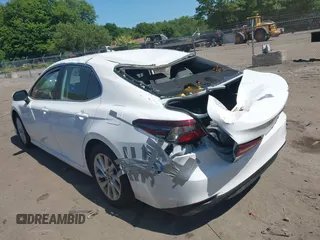 2023 Toyota Camry LE z VIN 4T1C11AK0PU145781, wystawiony jako IAAI lot #42404456 z przebiegiem 53 657 mil mil oraz . Historia ofert i sprzedaży dostępna na DreamBid. Obrazek 3.