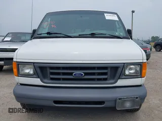 2006 Ford Econoline Cargo with VIN 1FTRE14WX6HB10268, listed as a IAAI auction lot 42502096 with 128,791 mi miles and . Bid and sale history available at DreamBid. Image 6.