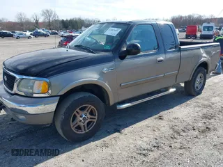 2003 Ford F-150 XL with VIN 1FTRX18L53NB01663, listed as a IAAI auction lot 41887655 with 177,914 mi miles. Bid and sale history available at carsss.com. Image 2.