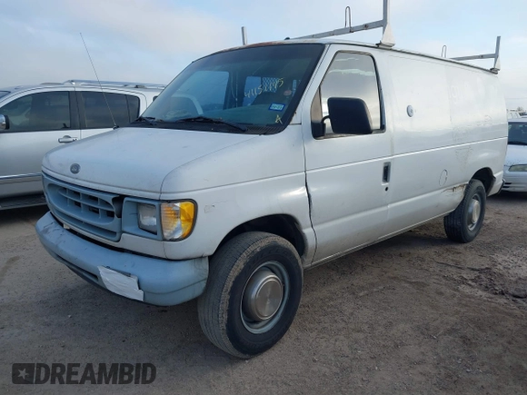 1999 Ford Econoline Cargo Commercial with VIN 1FTNE24L3XHB84868, listed as a IAAI auction lot 41151145 with 450,651 mi miles and . Bid and sale history available at carsss.com. Image 2.