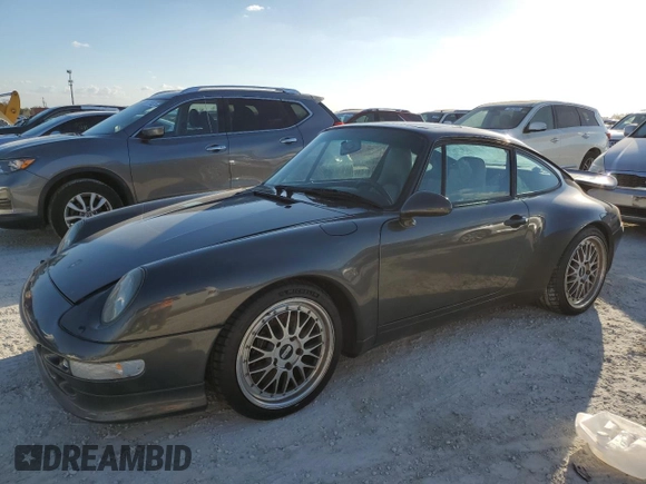 1995 Porsche 911 Carrera with VIN WP0AA2994SS323280, listed as a Copart auction lot 75304104 with 105,675 mi miles and Salvage Title. Bid and sale history available at carsss.com. Image 1.