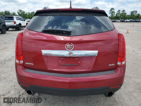 2014 Cadillac SRX Premium Collection z VIN 3GYFNDE33ES571840, wystawiony jako Copart lot #56823845 z przebiegiem 139 686 mil mil oraz Szkoda całkowita • Salvage title. Historia ofert i sprzedaży dostępna na DreamBid. Obrazek 6.