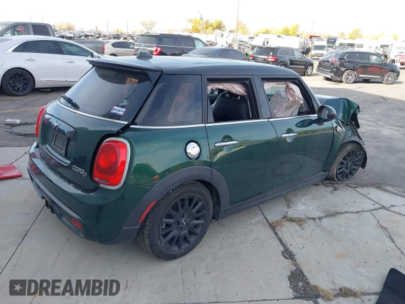 2016 MINI Cooper Hardtop 4 Door S with VIN WMWXU3C58G2D28227, listed as a IAAI auction lot 38046281 with 56,694 mi miles. Bid and sale history available at carsss.com. Image 4.