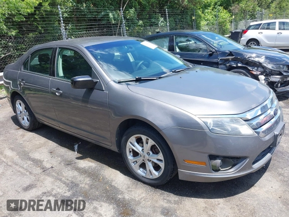 2012 Ford Fusion SE with VIN 3FAHP0HG5CR291511, listed as a IAAI auction lot 42546174 with 241,493 mi miles and . Bid and sale history available at DreamBid. Image 1.