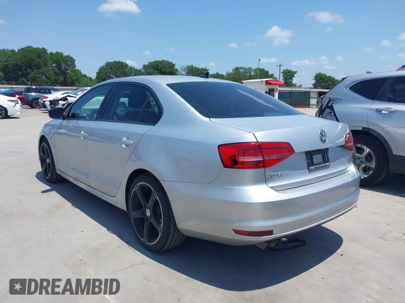 2015 Volkswagen Jetta S with VIN 3VW2K7AJ8FM217026, listed as a IAAI auction lot 42395393 with 181,789 mi miles and . Bid and sale history available at DreamBid. Image 3.