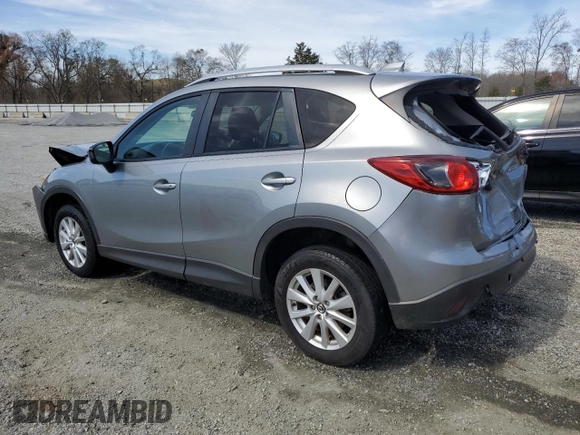 2014 Mazda CX-5 Touring with VIN JM3KE4CY1E0365787, listed as a Copart auction lot 49103355 with 144,031 mi miles and Salvage Title. Bid and sale history available at carsss.com. Image 2.