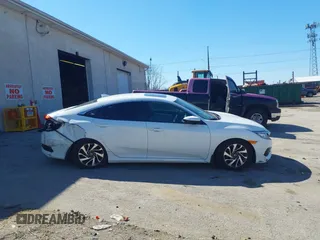 2018 Honda Civic EX with VIN 2HGFC2F75JH511025, listed as a IAAI auction lot 41768733 with 56,707 mi miles and . Bid and sale history available at DreamBid. Image 13.