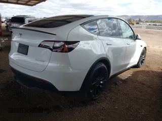 2022 Tesla Model Y Performance with VIN 7SAYGDEF4NF449986, listed as a IAAI auction lot 41754916 with 64,384 mi miles and . Bid and sale history available at DreamBid. Image 4.
