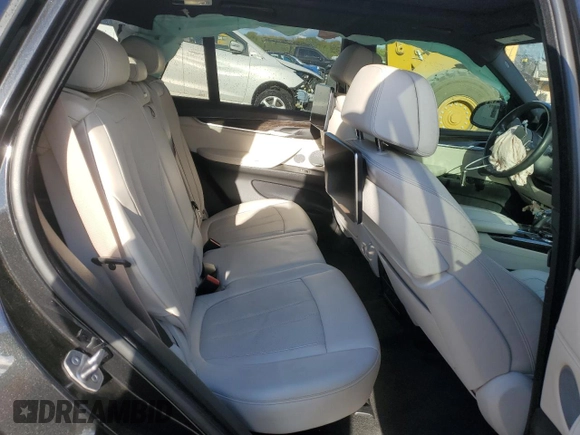 2017 BMW X5 xDrive50i with VIN 5UXKR6C54H0J84099, listed as a Copart auction lot 76269094 with 68,026 mi miles and Salvage title. Bid and sale history available at DreamBid. Image 11.