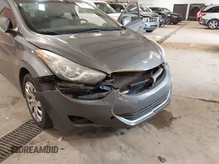 2012 Hyundai Elantra Limited z VIN 5NPDH4AE4CH124730, wystawiony jako IAAI lot #41379631 z przebiegiem 175 790 mil mil oraz . Historia ofert i sprzedaży dostępna na DreamBid. Obrazek 6.