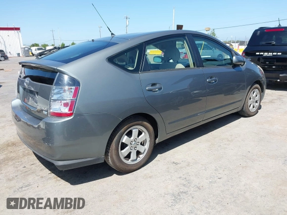 2004 Toyota Prius with VIN JTDKB20U840035148, listed as a IAAI auction lot 42086608 with 87,207 mi miles and . Bid and sale history available at DreamBid. Image 4.