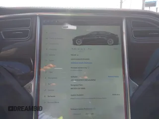 2014 Tesla Model S 60 z VIN 5YJSA1H13EFP42250, wystawiony jako IAAI lot #42267590 z przebiegiem 196 142 mil mil oraz . Historia ofert i sprzedaży dostępna na DreamBid. Obrazek 7.