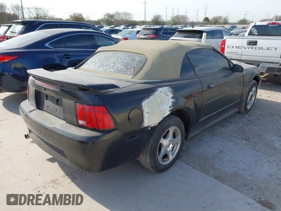 2004 Ford Mustang Deluxe with VIN 1FAFP44624F133914, listed as a IAAI auction lot 41699614 with 170,650 mi miles. Bid and sale history available at carsss.com. Image 4.