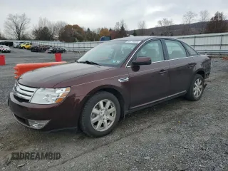 2009 Ford Taurus SE with VIN 1FAHP23W89G125025, listed as a Copart auction lot 80710004 with 114,176 mi miles and Salvage Title. Bid and sale history available at carsss.com. Image 1.