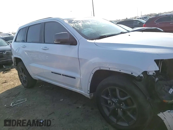2021 Jeep Grand Cherokee 80th Anniversary with VIN 1C4RJFBG6MC674921, listed as a Copart auction lot 49873555 with 52,668 mi miles and Salvage Title. Bid and sale history available at DreamBid. Image 12.