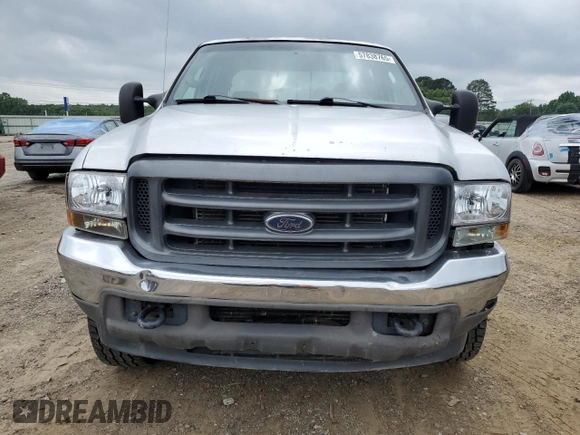 2004 Ford F-250 XL with VIN 1FTNW21L94EE03900, listed as a Copart auction lot 57838765 with 185,837 mi miles and Salvage title. Bid and sale history available at DreamBid. Image 5.