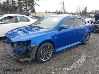 2017 Mitsubishi Lancer ES with VIN JA32U2FU8HU009115, listed as a IAAI auction lot 41611048 with 87631 miles. Bid and sale history available at carsss.com. Image 18.