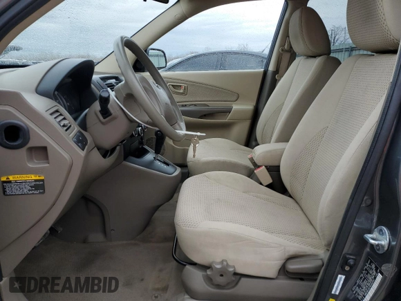 2009 Hyundai Tucson GLS with VIN KM8JM12B79U042597, listed as a Copart auction lot 52164465 with 90,943 mi miles and Salvage Title. Bid and sale history available at carsss.com. Image 7.